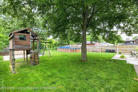 Exterior - 421 White Oak Dr, Perry, MI 48872 photo 7 of 12