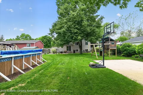 Exterior - 421 White Oak Dr, Perry, MI 48872 photo 6 of 12