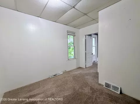 Bedroom - 126 E 1st St, Perry, MI 48872 photo 3 of 4