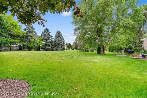 Exterior - 3294 Hidden Ridge Dr, Dewitt, MI 48820 photo 4 of 9