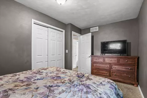 Bedroom - 4264 Kim Rye Ln, Holt, MI 48842 photo 6 of 8