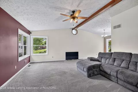 Living - 620 Meade Dr, Lansing, MI 48917 photo 2 of 2