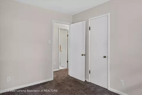 Bedroom - 12419 E Greenfield Rd, Lansing, MI 48917 photo 2 of 7