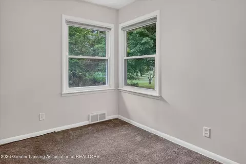 Bedroom - 12419 E Greenfield Rd, Lansing, MI 48917 photo 3 of 7