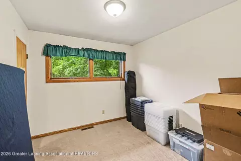 Bedroom - 6950 Delta River Dr, Lansing, MI 48906 photo 2 of 3