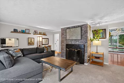 Living - 928 Robins Rd, Lansing, MI 48917 photo 2 of 3