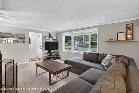 Living - 928 Robins Rd, Lansing, MI 48917 photo 3 of 3