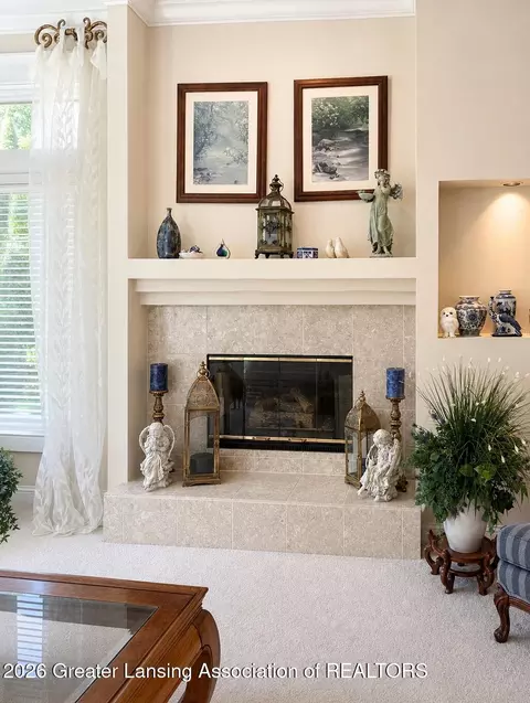 Living - 404 W Spring Meadows Ln, Dewitt, MI 48820 photo 2 of 4