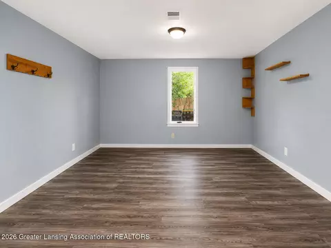 Living - 219 E Adelaide St, Maple Rapids, MI 48853 photo 3 of 3