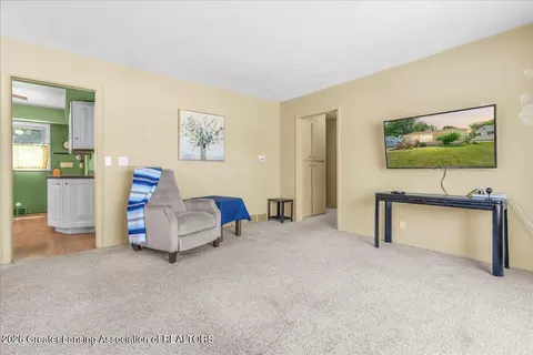 Living - 3229 Timber Dr, Lansing, MI 48917 photo 3 of 3