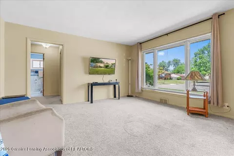 Living - 3229 Timber Dr, Lansing, MI 48917 photo 2 of 3