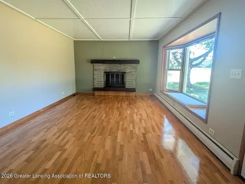 Living - 1033 W Round Lake Rd, Dewitt, MI 48820 photo 2 of 2