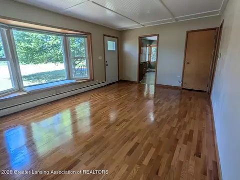 Living - 1033 W Round Lake Rd, Dewitt, MI 48820 photo 1 of 2