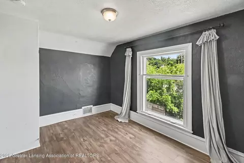 Bedroom - 915 E Cesar E Chavez Ave, Lansing, MI 48906 photo 2 of 2