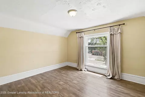 Bedroom - 915 E Cesar E Chavez Ave, Lansing, MI 48906 photo 1 of 2