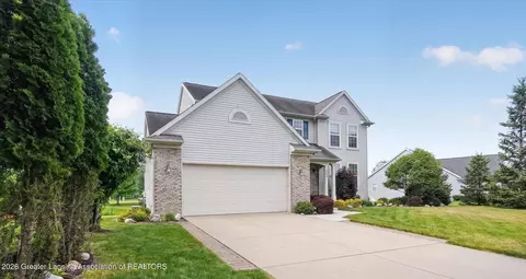 Exterior - 1241 Lobelia Ln, Dewitt, MI 48820 photo 2 of 10