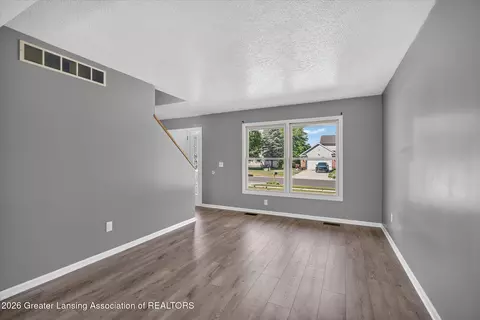 Living - 7211 Captiva Dr, Lansing, MI 48917 photo 1 of 6