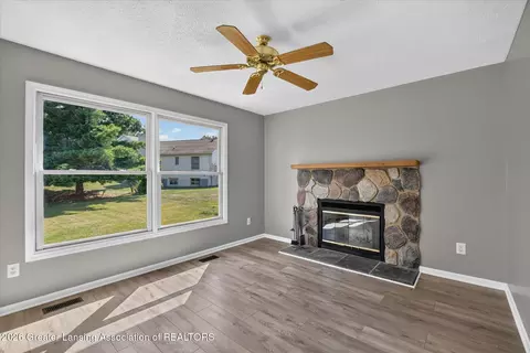 Living - 7211 Captiva Dr, Lansing, MI 48917 photo 5 of 6