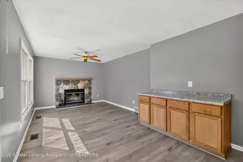 Living - 7211 Captiva Dr, Lansing, MI 48917 photo 4 of 6
