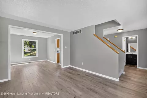 Living - 7211 Captiva Dr, Lansing, MI 48917 photo 2 of 6