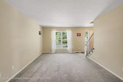 Living - 444 Fox Run Ct, Williamston, MI 48895 photo 1 of 2