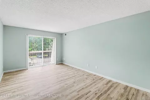 Living - 4641 Gull Rd #61, Lansing, MI 48917 photo 1 of 2