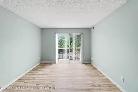 Living - 4641 Gull Rd #61, Lansing, MI 48917 photo 2 of 2