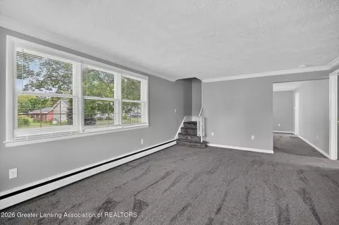 Living - 128 E Orchard St, Perry, MI 48872 photo 5 of 6