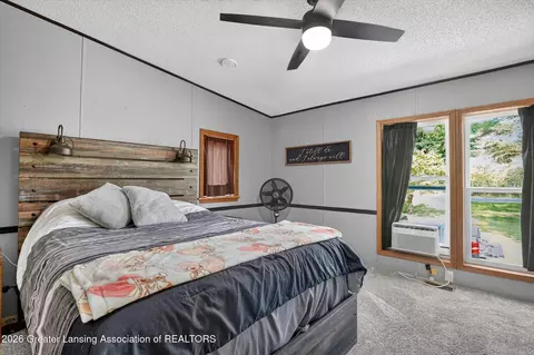 Bedroom - 13998 Center Rd, Bath, MI 48808 photo 1 of 8