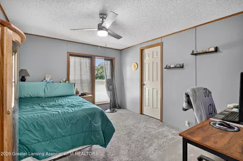 Bedroom - 13998 Center Rd, Bath, MI 48808 photo 4 of 8
