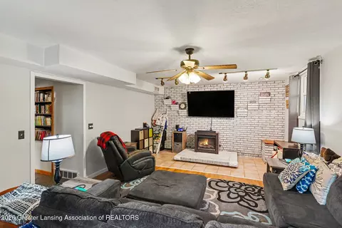 Living - 210 Devon Hill Dr, Mason, MI 48854 photo 2 of 2