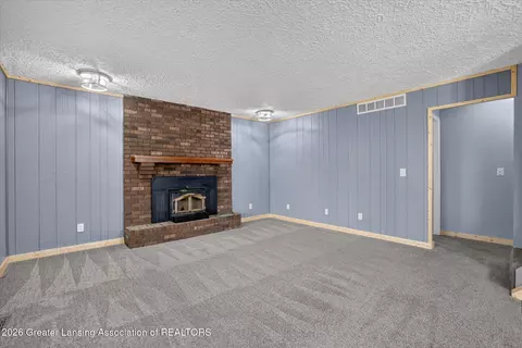 Living - 1109 Mora Cir, Dewitt, MI 48820 photo 3 of 5