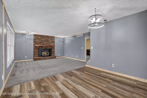 Living - 1109 Mora Cir, Dewitt, MI 48820 photo 2 of 5