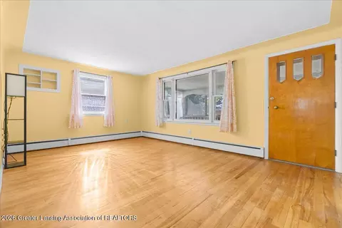 Living - 4520 Monroe St, Holt, MI 48842 photo 2 of 2