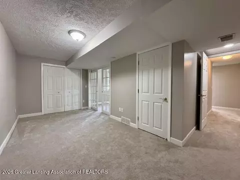 Bedroom - 15123 Classic Dr #49, Bath, MI 48808 photo 6 of 7