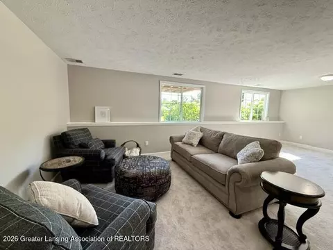 Living - 15123 Classic Dr #49, Bath, MI 48808 photo 4 of 4