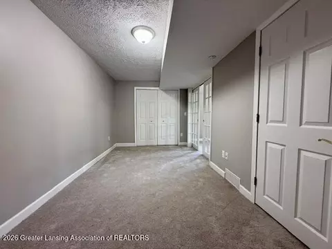 Bedroom - 15123 Classic Dr #49, Bath, MI 48808 photo 5 of 7