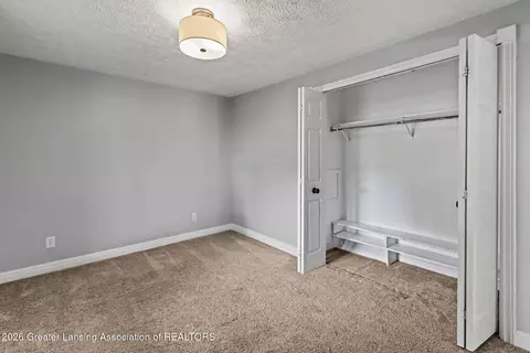 Bedroom - 5490 W Howe Rd, Dewitt, MI 48820 photo 2 of 5