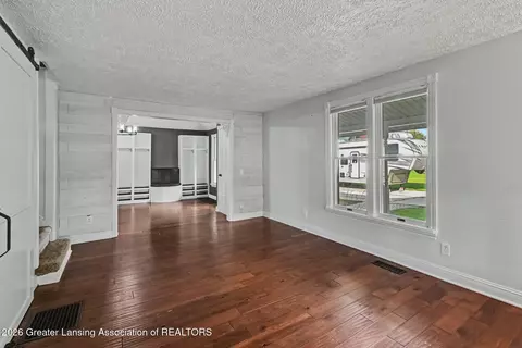 Living - 5490 W Howe Rd, Dewitt, MI 48820 photo 4 of 5
