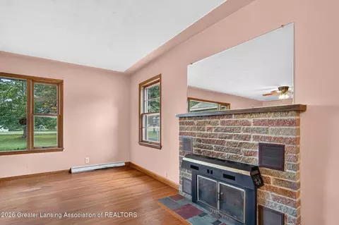Living - 9207 W Herbison Rd, Eagle, MI 48822 photo 4 of 5