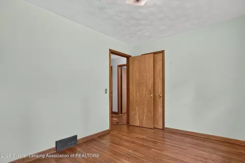 Bedroom - 9207 W Herbison Rd, Eagle, MI 48822 photo 4 of 6