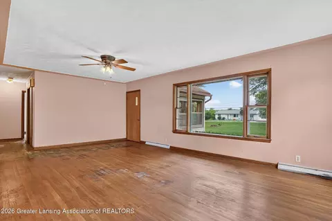 Living - 9207 W Herbison Rd, Eagle, MI 48822 photo 3 of 5