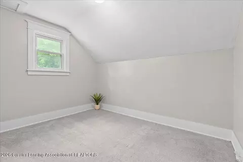 Bedroom - 321 E Thomas St, Lansing, MI 48906 photo 2 of 6