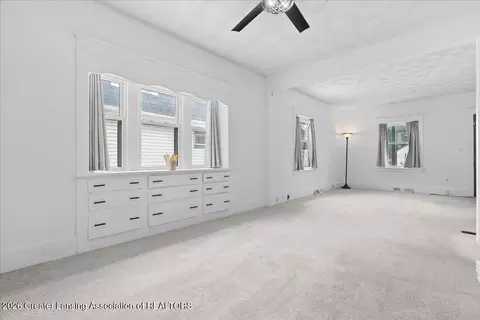 Living - 321 E Thomas St, Lansing, MI 48906 photo 2 of 3