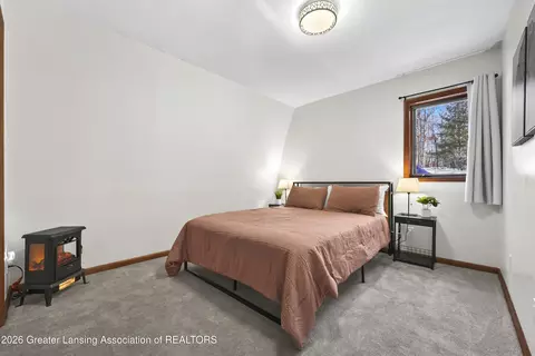 Bedroom - 2889 W Sunset Dr, Roscommon, MI 48653 photo 5 of 5