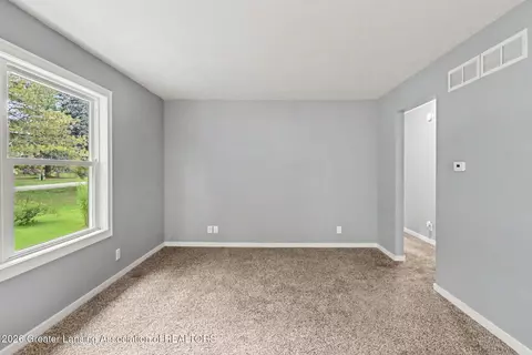 Living - 236 Dunham St, Sunfield, MI 48890 photo 2 of 2