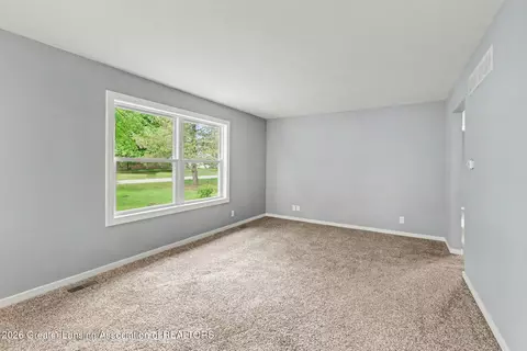 Living - 236 Dunham St, Sunfield, MI 48890 photo 1 of 2