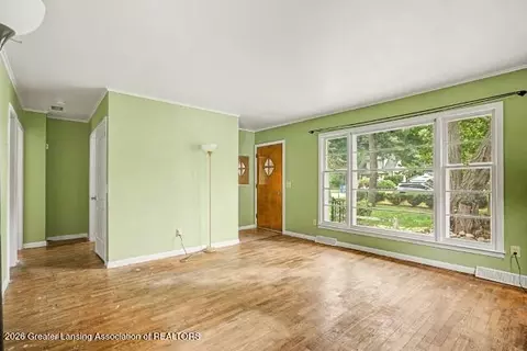 Living - 6342 Rosedale Rd, Lansing, MI 48911 photo 1 of 2