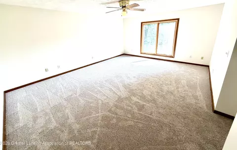 Living - 1114 Wolf Run Dr, Lansing, MI 48917 photo 4 of 5