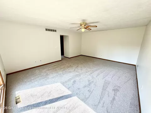 Living - 1114 Wolf Run Dr, Lansing, MI 48917 photo 5 of 5